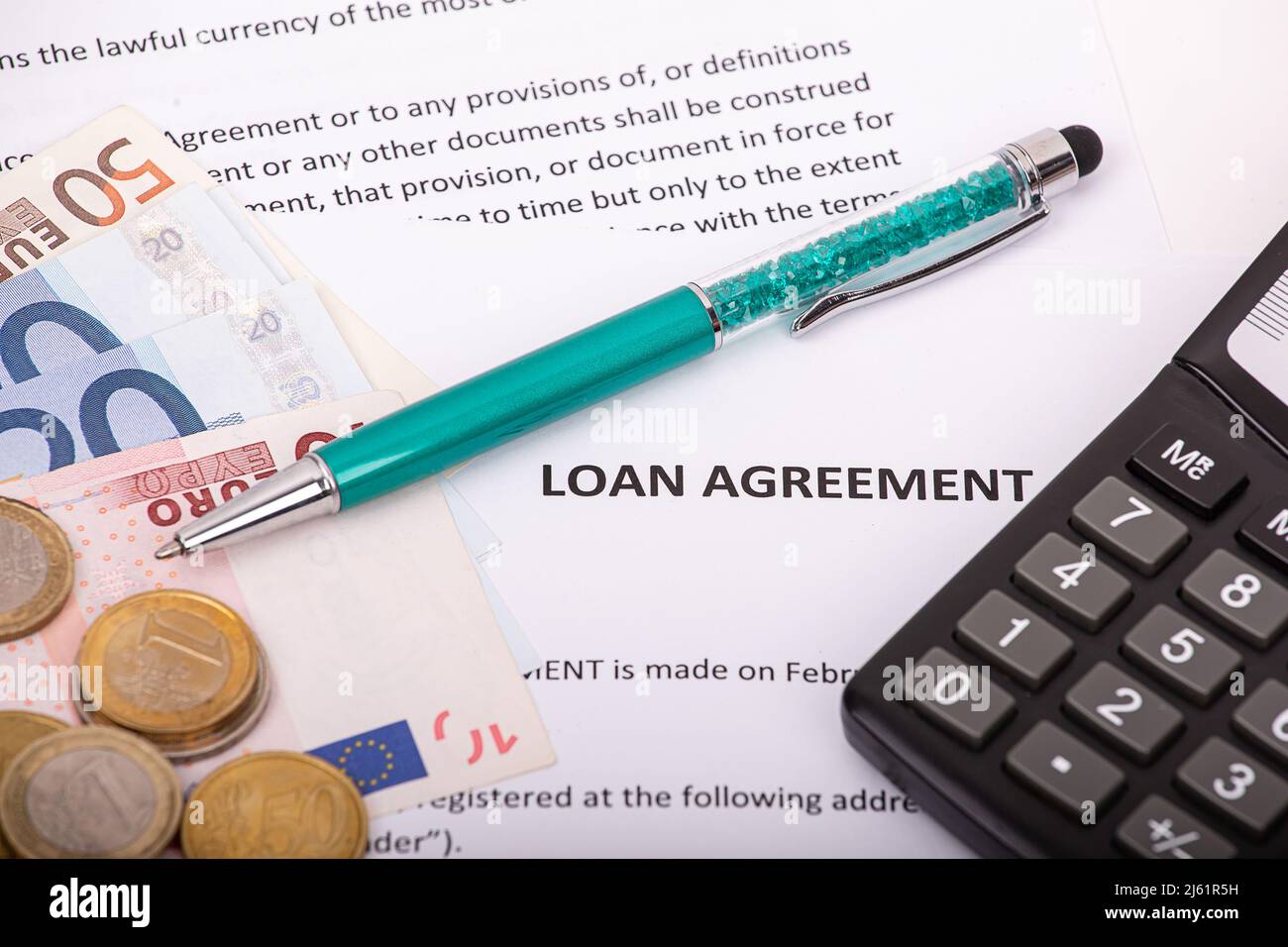 Mortgage. Euro, pen and calculator are on the loan agreement Stock Photo -  Alamy