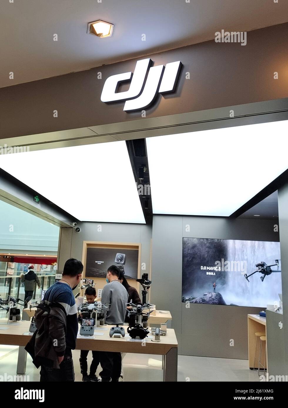 SHANGHAI, CHINA - 27, 2022 - Customers are seen at a DJI drone store Shanghai, China, on December 18, 2021. April 27, 2022 -- Chinese drone DJI has announced