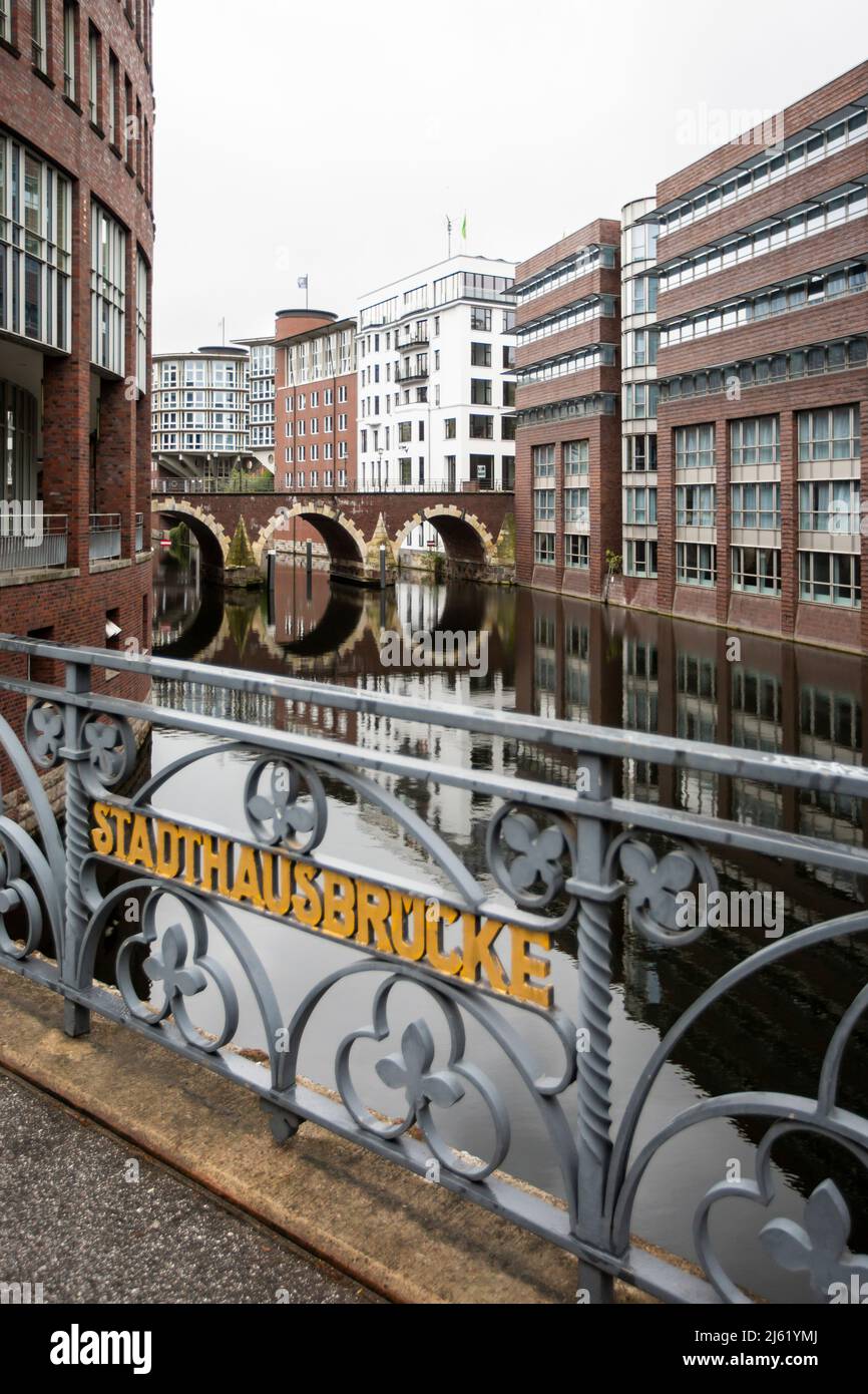 Germany, Hamburg, Bleichenfleet canal with Stadthausbrucke in foreground and Ellerntorsbrucke in background Stock Photo