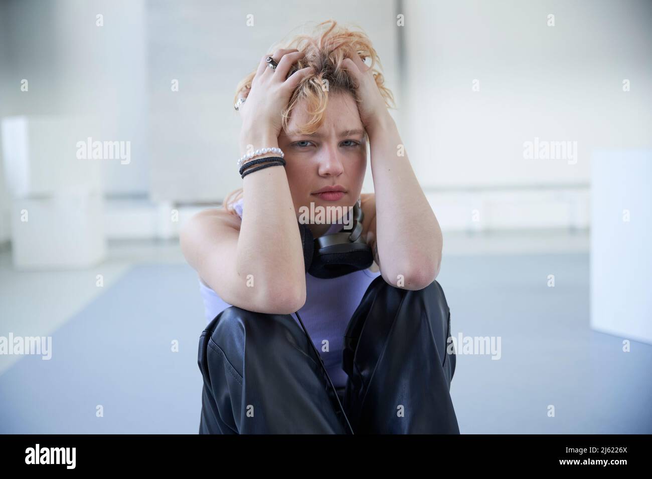 Sad woman interior portrait hi-res stock photography and images - Alamy