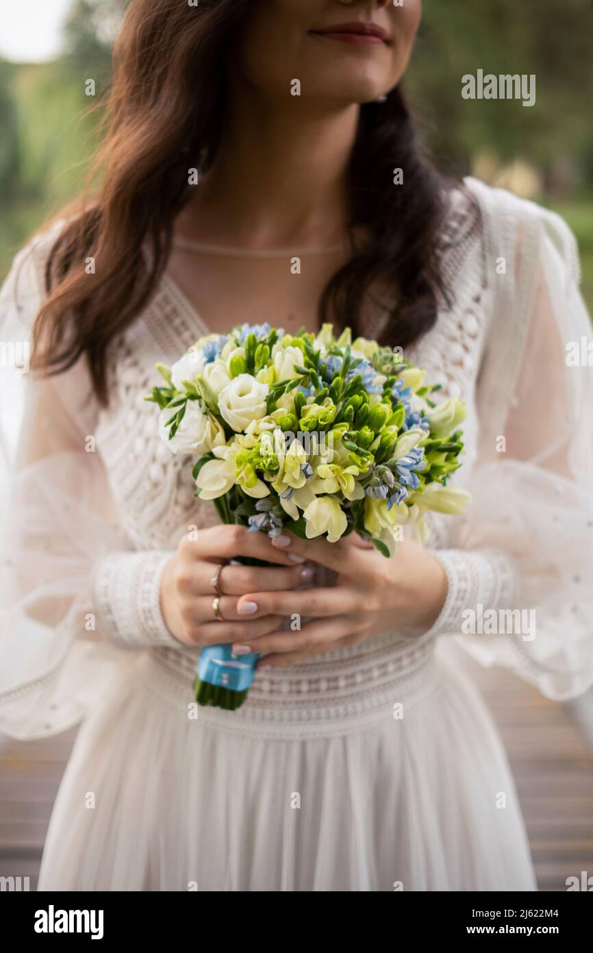 Holding flower smiling hi-res stock photography and images - Alamy