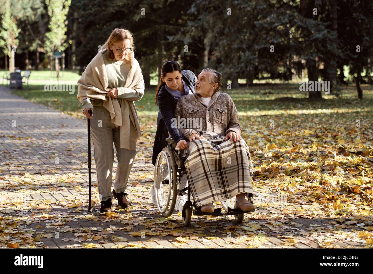 Man woman walking stick senior hi-res stock photography and images - Alamy