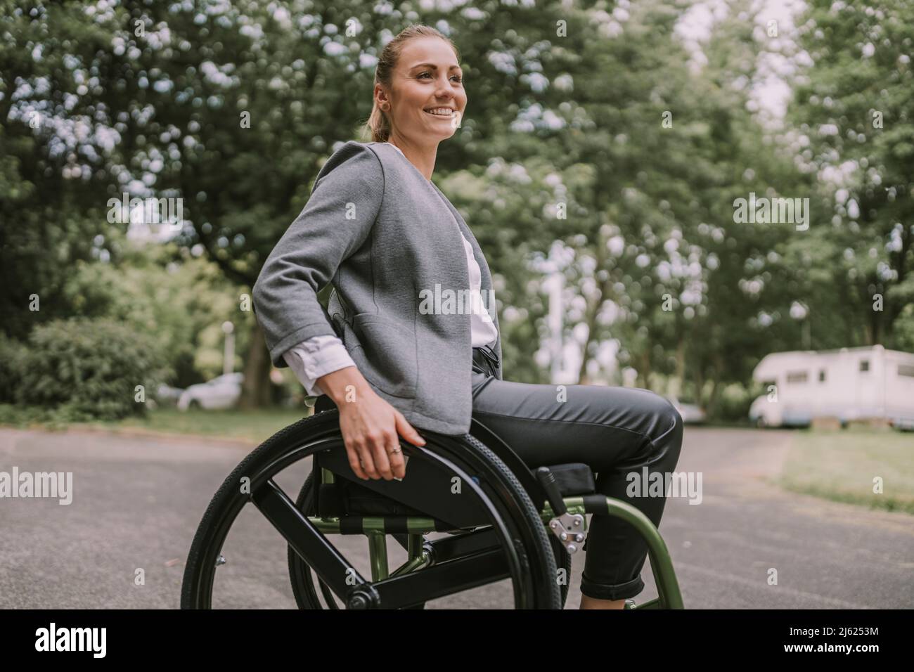 Happy wheelchair people hi-res stock photography and images - Alamy