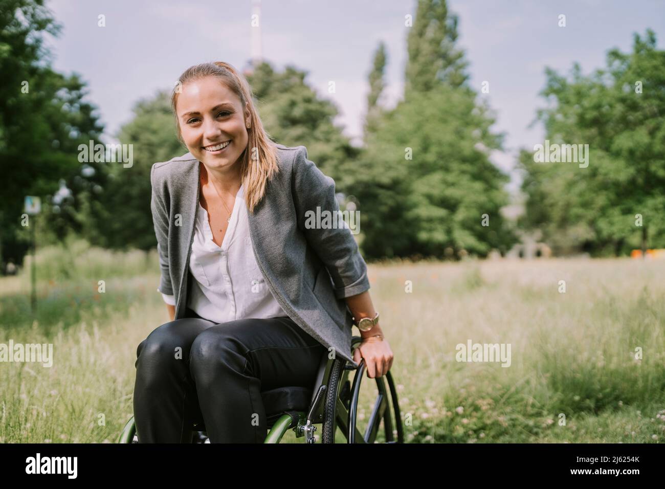 Happy wheelchair user hi-res stock photography and images - Alamy