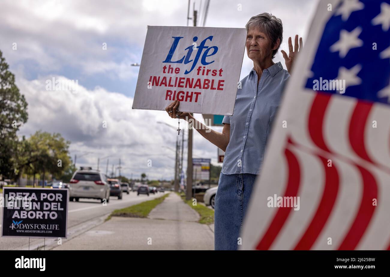 Patricia, an anti-abortion protestor, stands outside Planned Parenthood in Jacksonville, Florida, U.S., March 16, 2022.  REUTERS/Evelyn Hockstein       SEARCH 'HOCKSTEIN USA ABORTION' FOR THIS STORY. SEARCH 'WIDER IMAGE' FOR ALL STORIES. Stock Photo