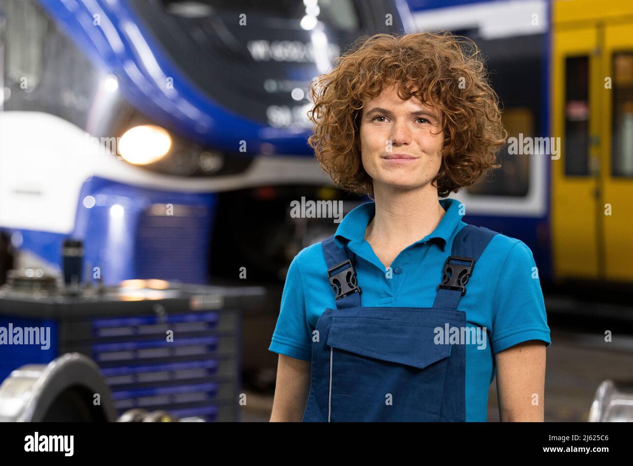 Engineer standing in warehouse at industry Stock Photo