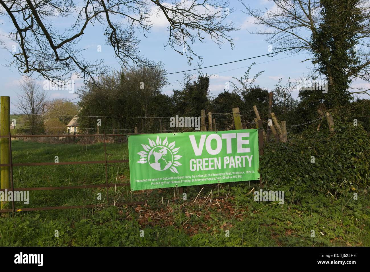 Vote Green Party banners in a rural setting, Oxfordshire, England. Banners are place on the site of Asthall Manor, a 17thC stately house Stock Photo
