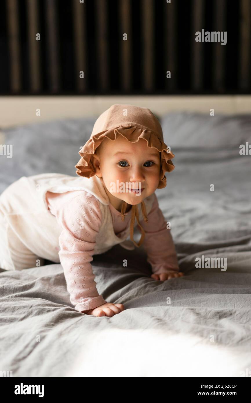 Crawling on bed hires stock photography and images Alamy
