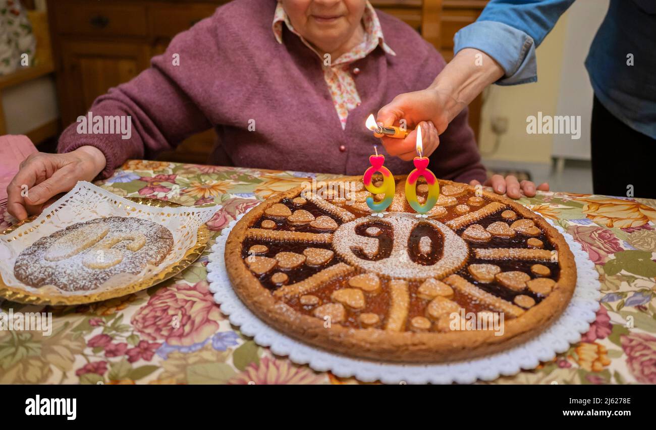 Senior woman at 90's birthday party Stock Photo
