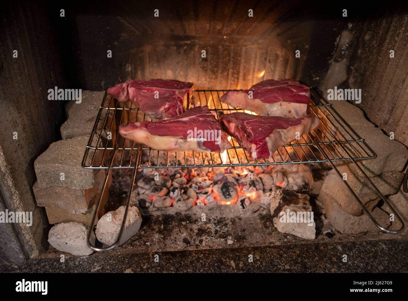 Barbecue Italian Fiorentina steak on the grill Stock Photo - Alamy