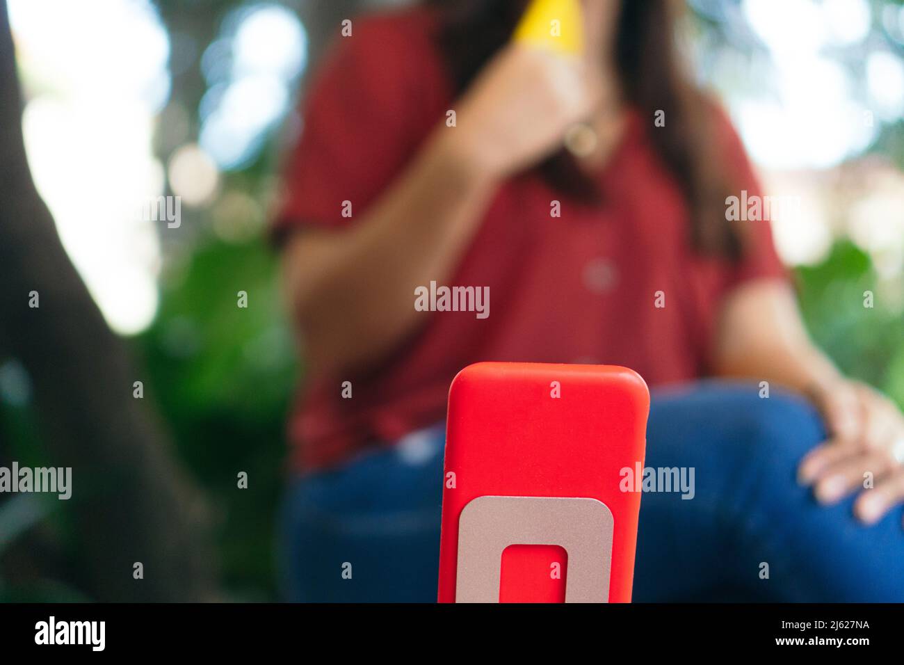 Anonymous smiling woman making phone hi-res stock photography and ...