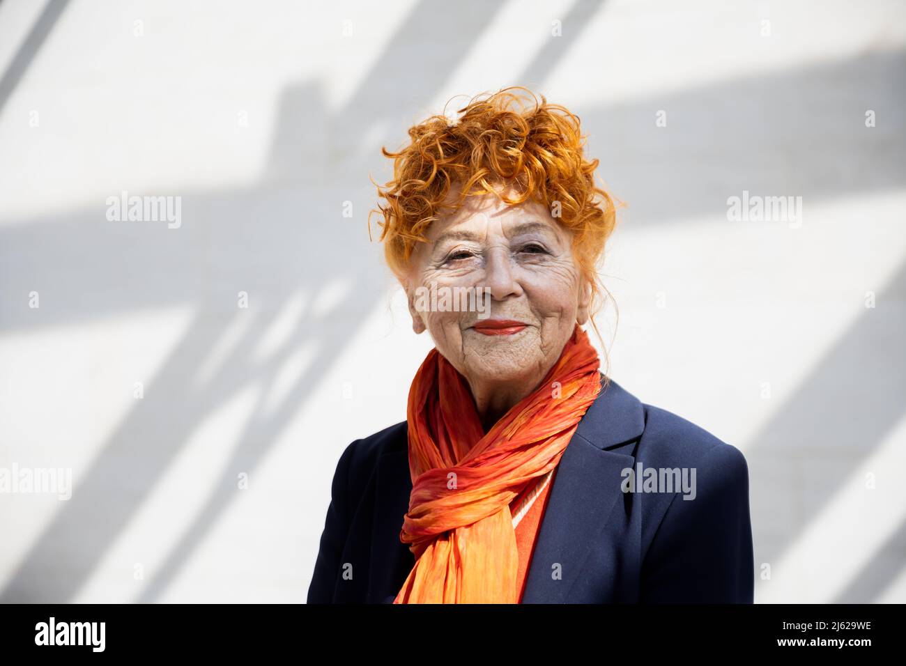 Berlin, Germany. 27th Apr, 2022. Herlinde Koelbl, photographer, stands at a press event for her exhibition 'Angela Merkel Portraits 1991 - 2021' at the German Historical Museum. The exhibition is on view from April 29, 2022 to September 4, 2022. Credit: Christoph Soeder/dpa/Alamy Live News Stock Photo