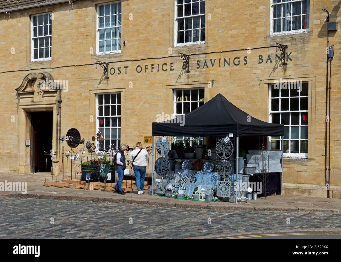 Market stall and post office, Oakham, Rutland, England UK Stock Photo