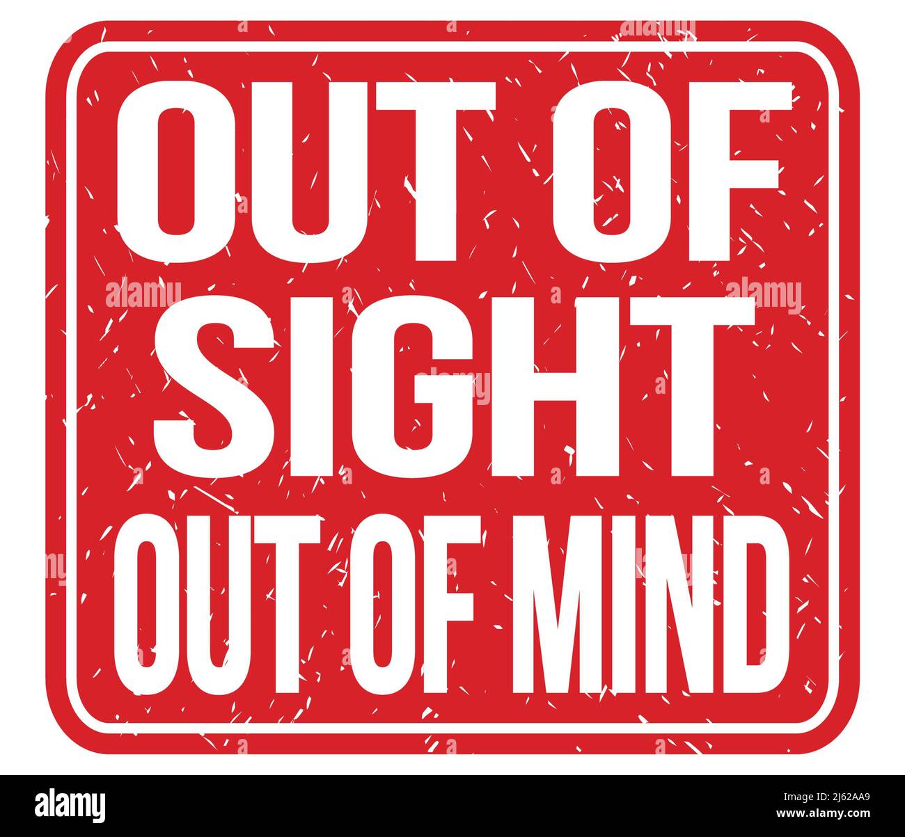 OUT OF SIGHT OUT OF MIND, text written on red stamp sign Stock Photo