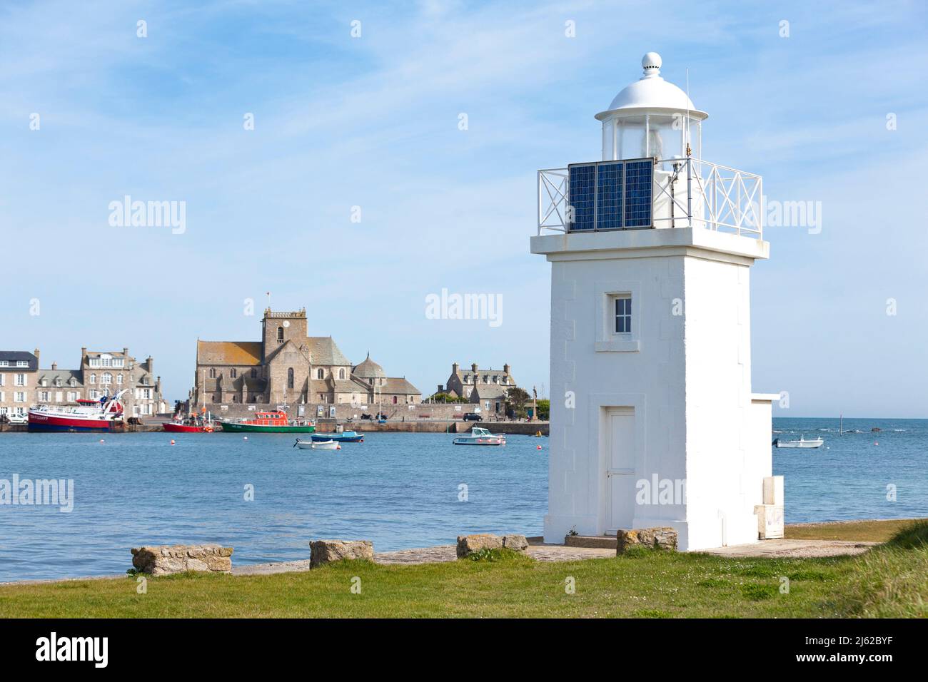 Harbor with lighthouse of Barfleur in Normandy, Cotentin Peninsula, Manche, France Stock Photo