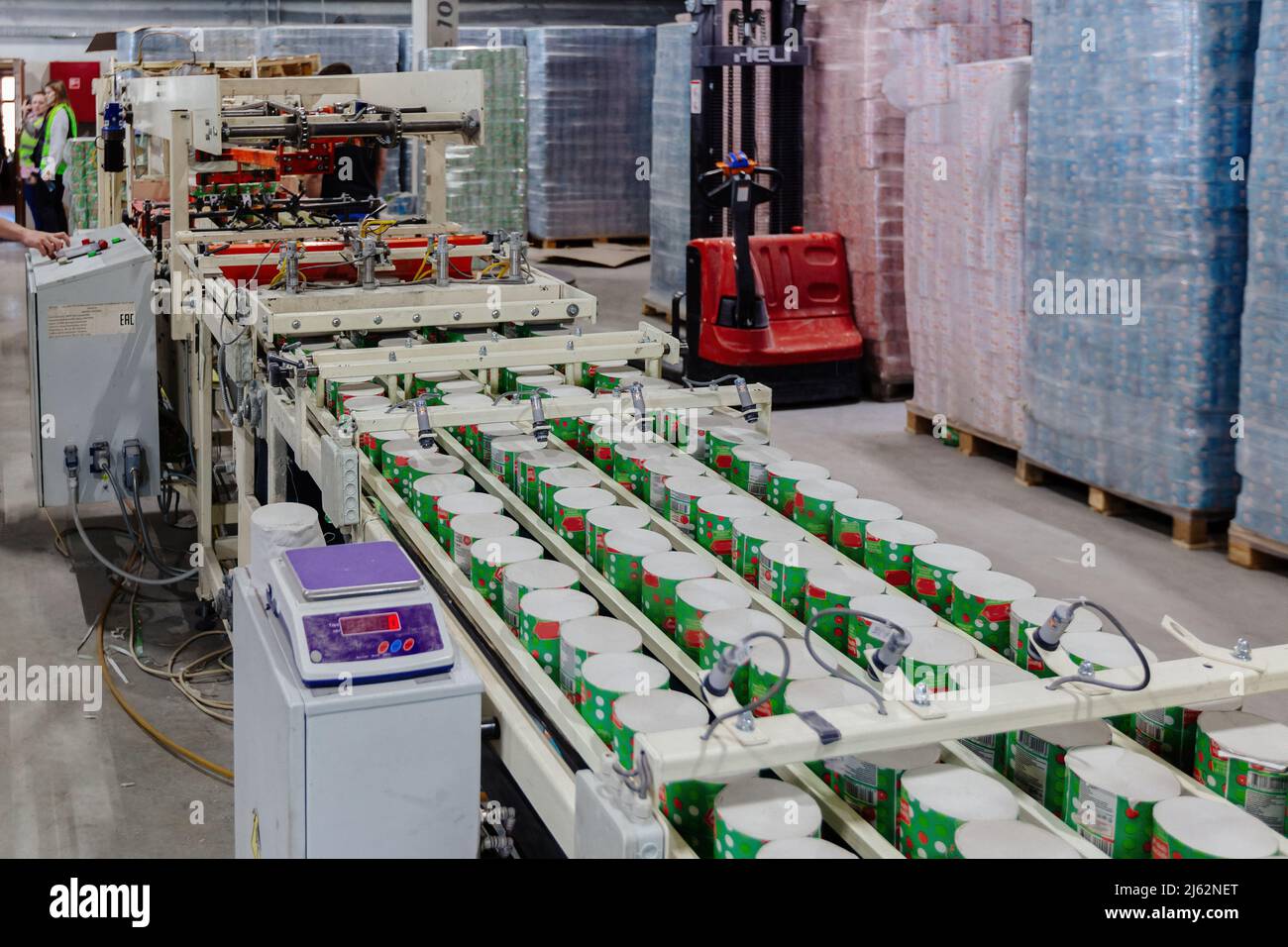 Toilet paper production line. Rolls of toilet paper on conveyor Stock