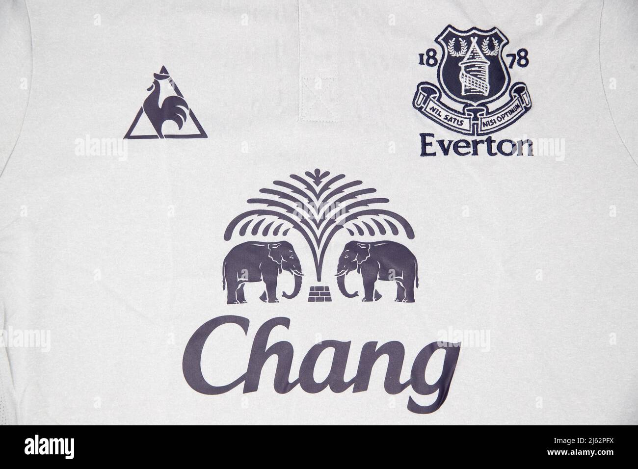 Everton badge on a white football shirt with Chang Sponsor Stock Photo