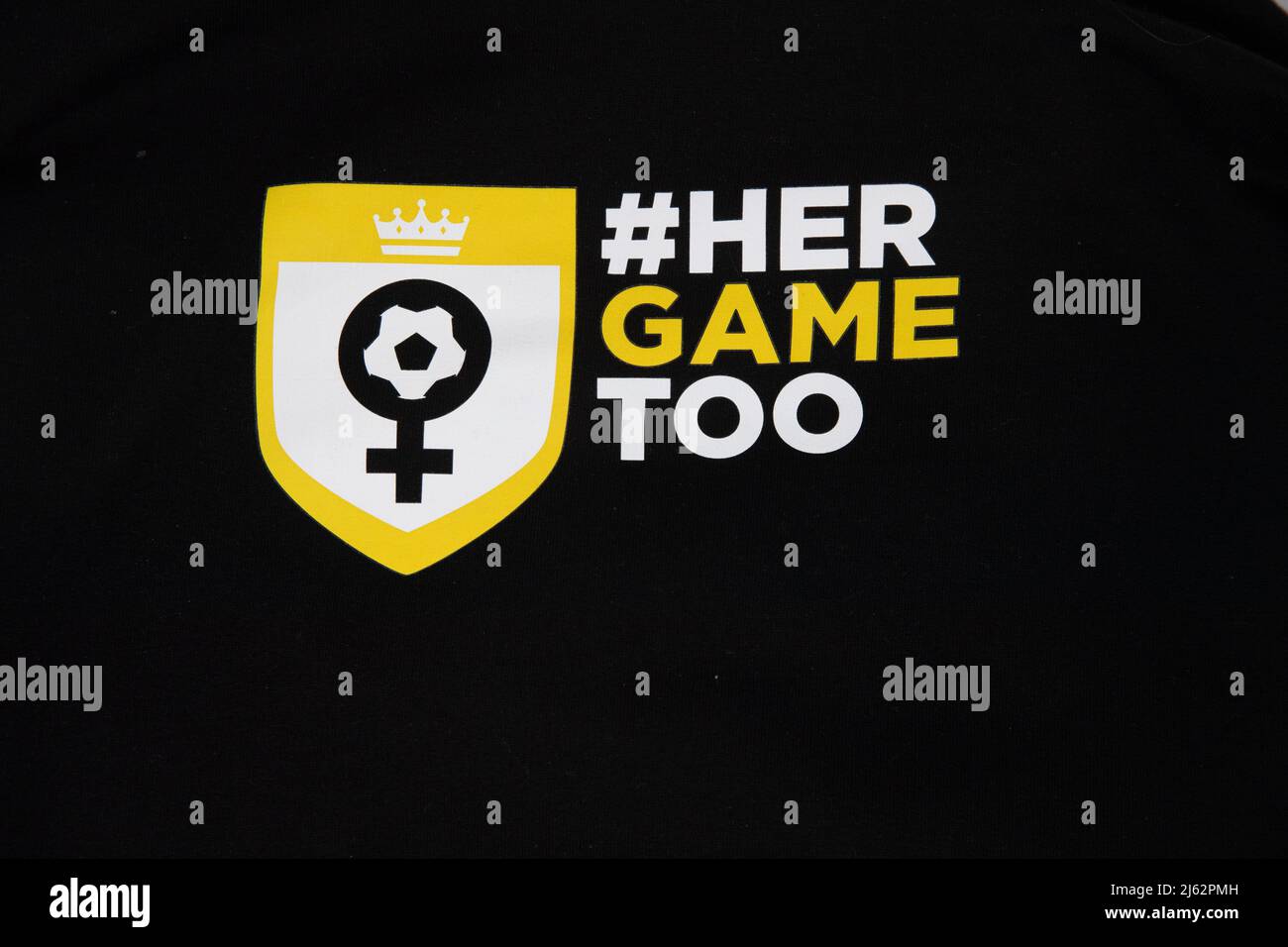 Her Game Too Logo on front of a hoody Stock Photo
