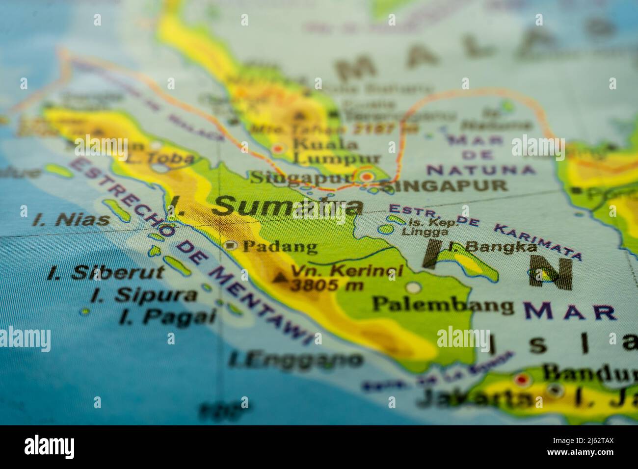 Close-up of the orographic map of Sumatra island of Indonesia in the Pacific Ocean south of the Indonesian Peninsula with references in Spanish. Conce Stock Photo