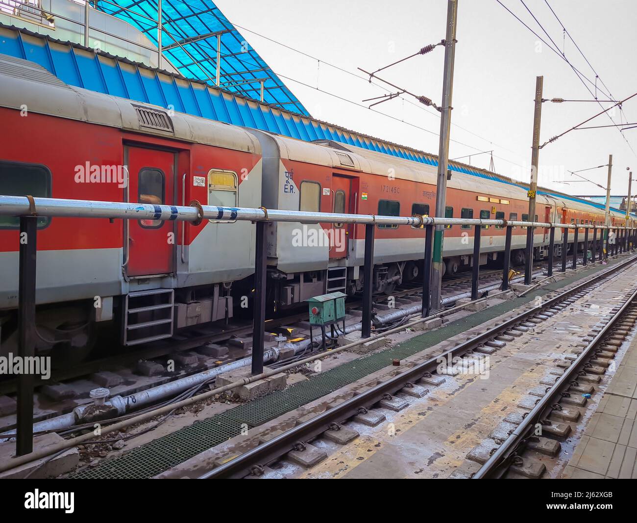 train parked at platform with flat sky at morning from flat angle image is taken at new delhi india on Apr 10 2020. Stock Photo