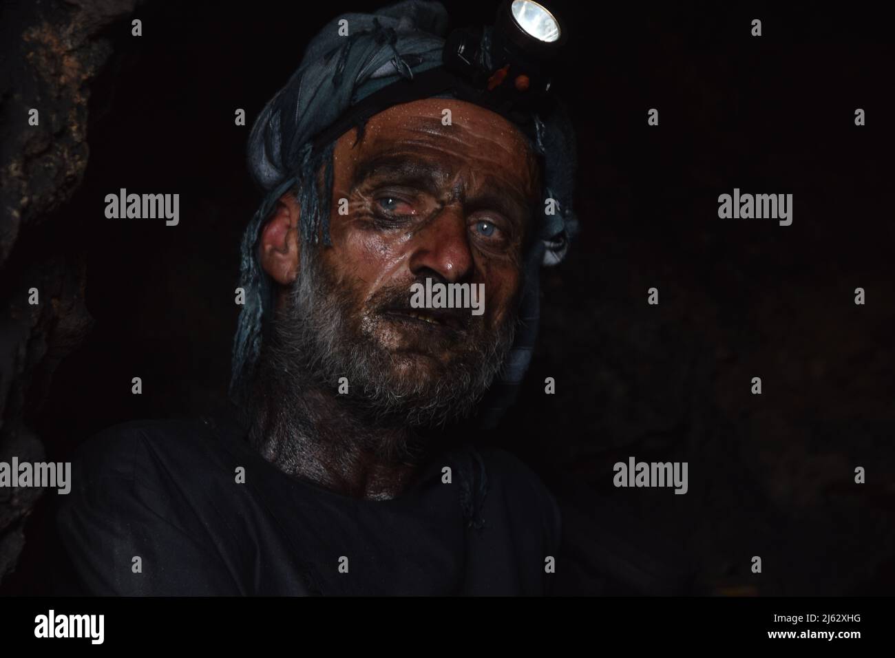 Baghlan, Afghanistan. 26th Apr, 2022. A man works in a coal mine in Baghlan Province, Afghanistan, April 26, 2022. TO GO WITH 'Afghan economic commission meets on private sector, prioritizes power supply' Credit: Mehrab Ibrahimi/Xinhua/Alamy Live News Stock Photo