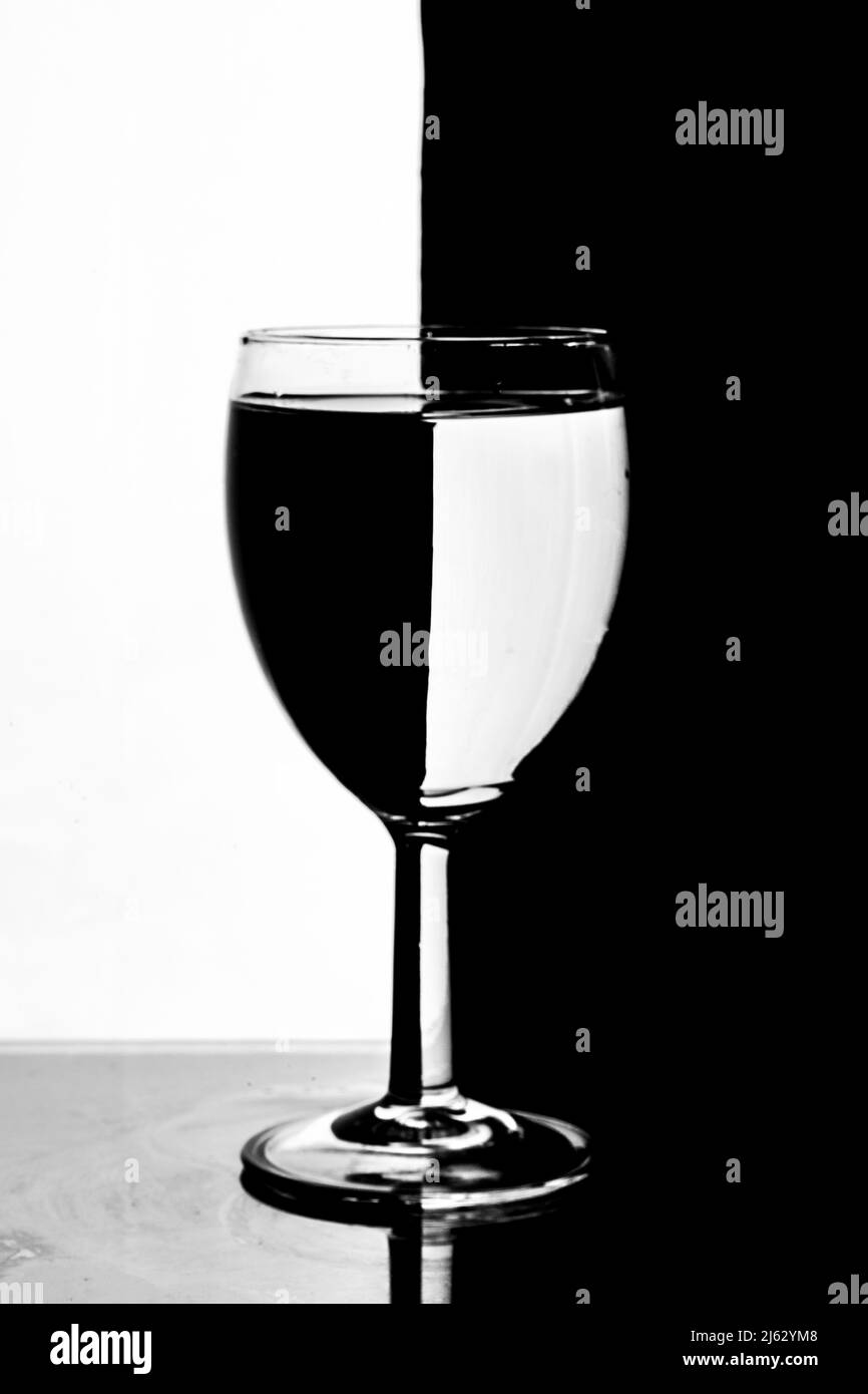 wine glass and glassware product photography using a single light and a black background Stock Photo