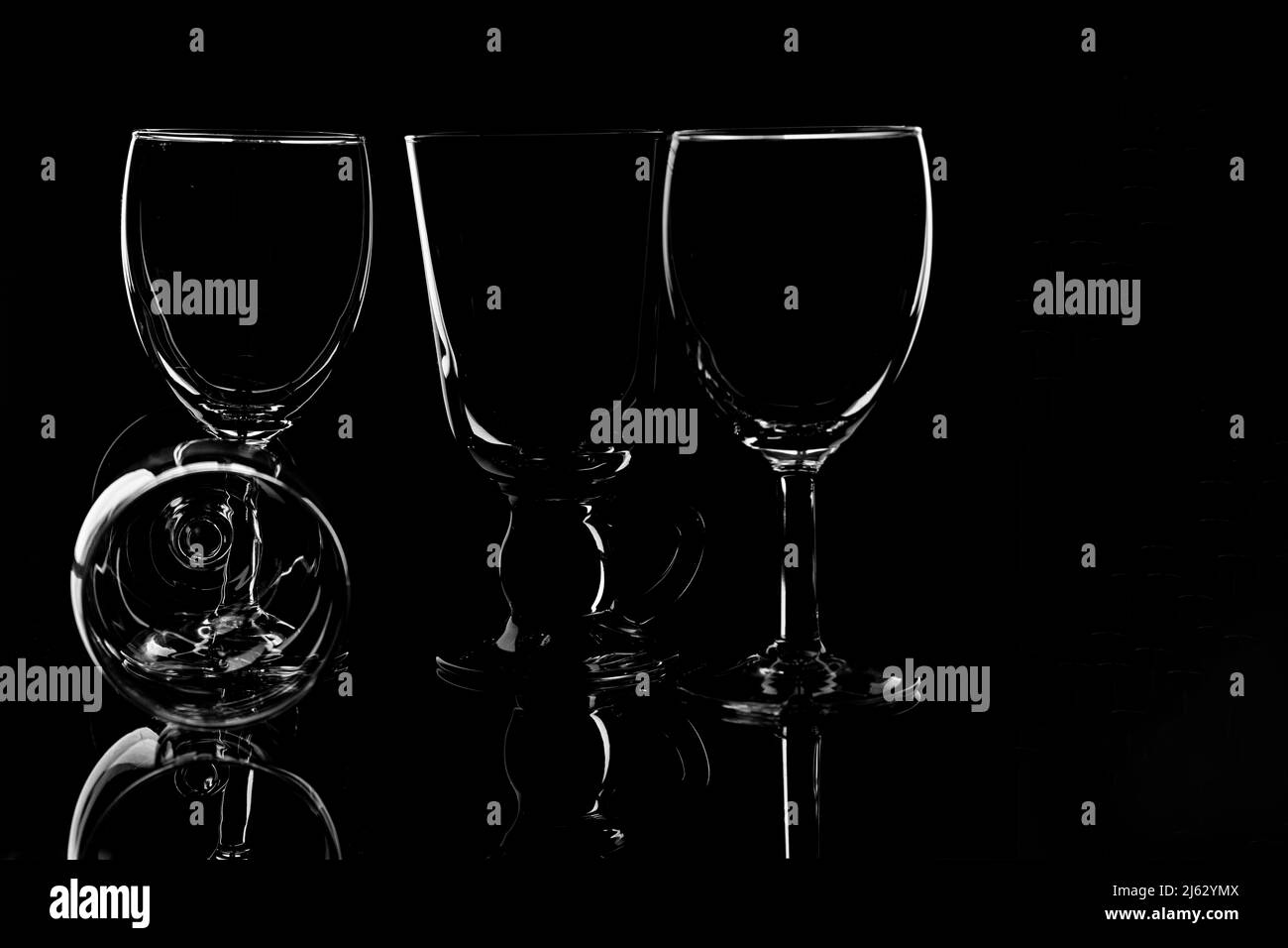 wine glass and glassware product photography using a single light and a black background Stock Photo