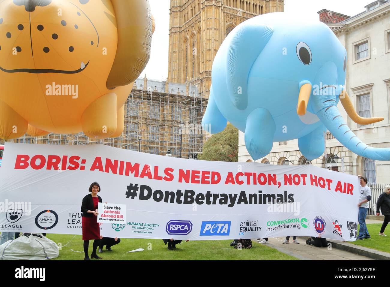 London, UK. 27th Apr, 2022. Animal welfare organisations gathered outside the Houses of Parliament flying huge lion and elephant balloons as the government is reported to drop the Animals Abroad Bill. The organisations are calling on the government to protect animals abroad. Credit: Uwe Deffner/Alamy Live News Stock Photo