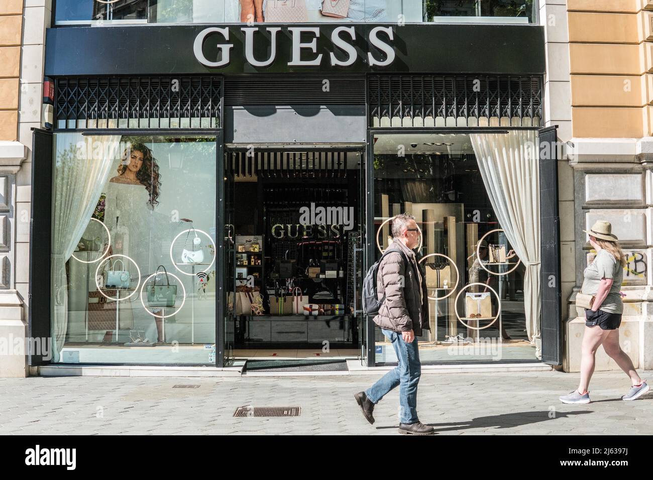 Barcelona, Spain. 26th Apr, 2022. A pedestrians walks past the American  multinational clothing brand Guess store in Barcelona. (Credit Image: ©  Thiago Prudencio/SOPA Images via ZUMA Press Wire Stock Photo - Alamy