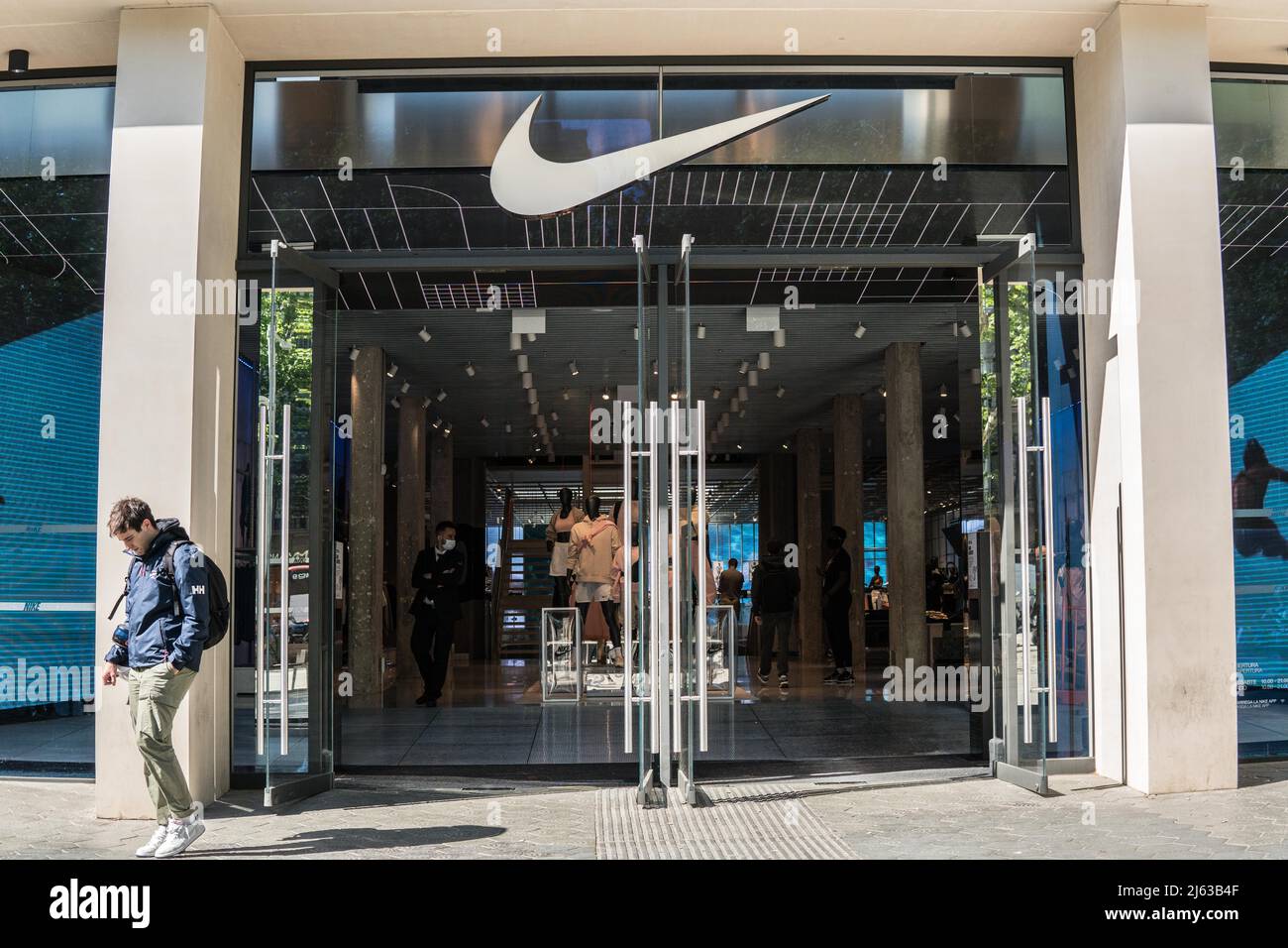 Barcelona, Spain. 26th Apr, 2022. A walks past the American multinational sport clothing brand Nike
