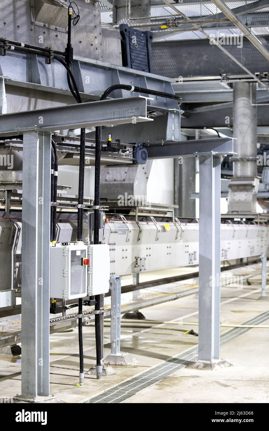 The stop, go, emergency stop, and speed control panel for a conveyor