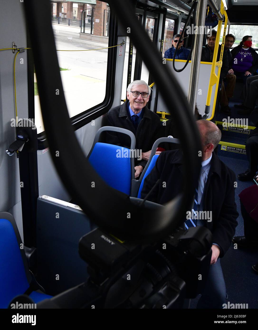 Wisconsin Governor Bus April 27, 2022, Racine, Wisconsin, USA: WisconsIn GOV. TONY EVERS helps ...