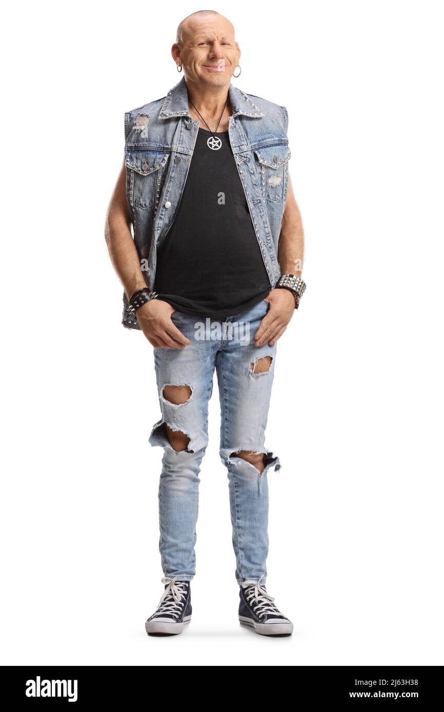 Bald man in a denim vest and jeans posing isolated on white