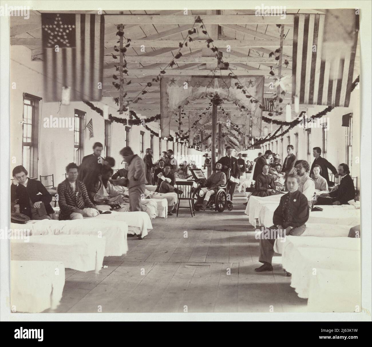 Armory Square Hospital, Washington, 1863–65. The view shows Ward F and appears to document an anniversary of the facility, complete with flags, everg Stock Photo