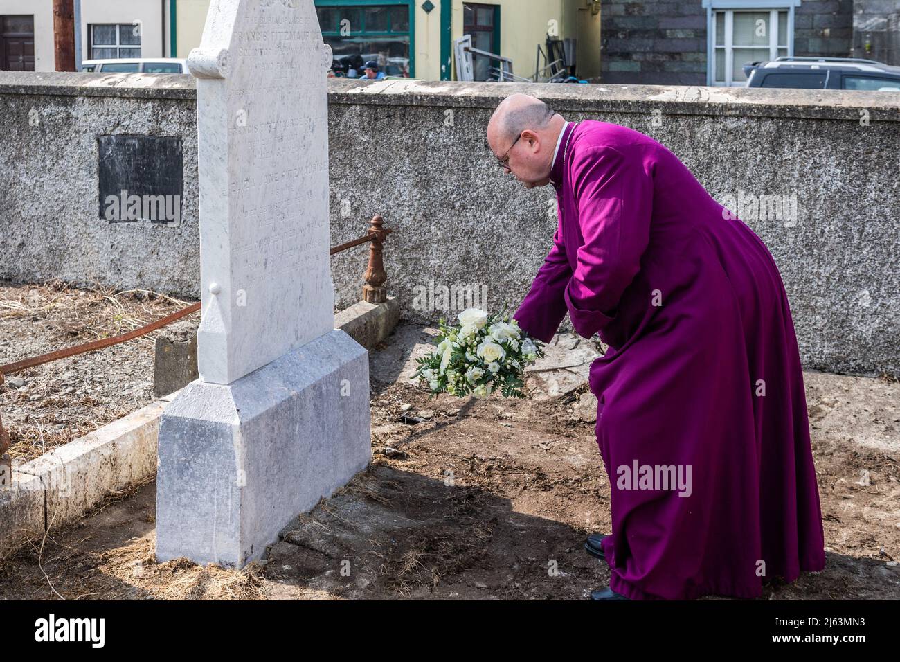 Dunmanway, West Cork, Ireland. 27th Apr, 2022. Today is the 100th Anniversary of the Bandon Valley killings, where 3 men from Dunmanway were shot dead. Bishop of Cork, Cloyne and Ross, Dr. Paul Colton, lays a wreath on the grave of 72 year old victim Francis Fitzmaurice. Credit: AG News/Alamy Live News Stock Photo