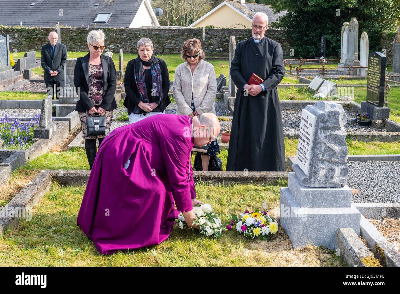 Dunmanway, West Cork, Ireland. 27th Apr, 2022. Today is the 100th Anniversary of the Bandon Valley killings, where 3 men from Dunmanway were shot dead. Bishop of Cork, Cloyne and Ross, Dr. Paul Colton, lays a wreath on the grave of 37 year old victim David Gray. Credit: AG News/Alamy Live News Stock Photo