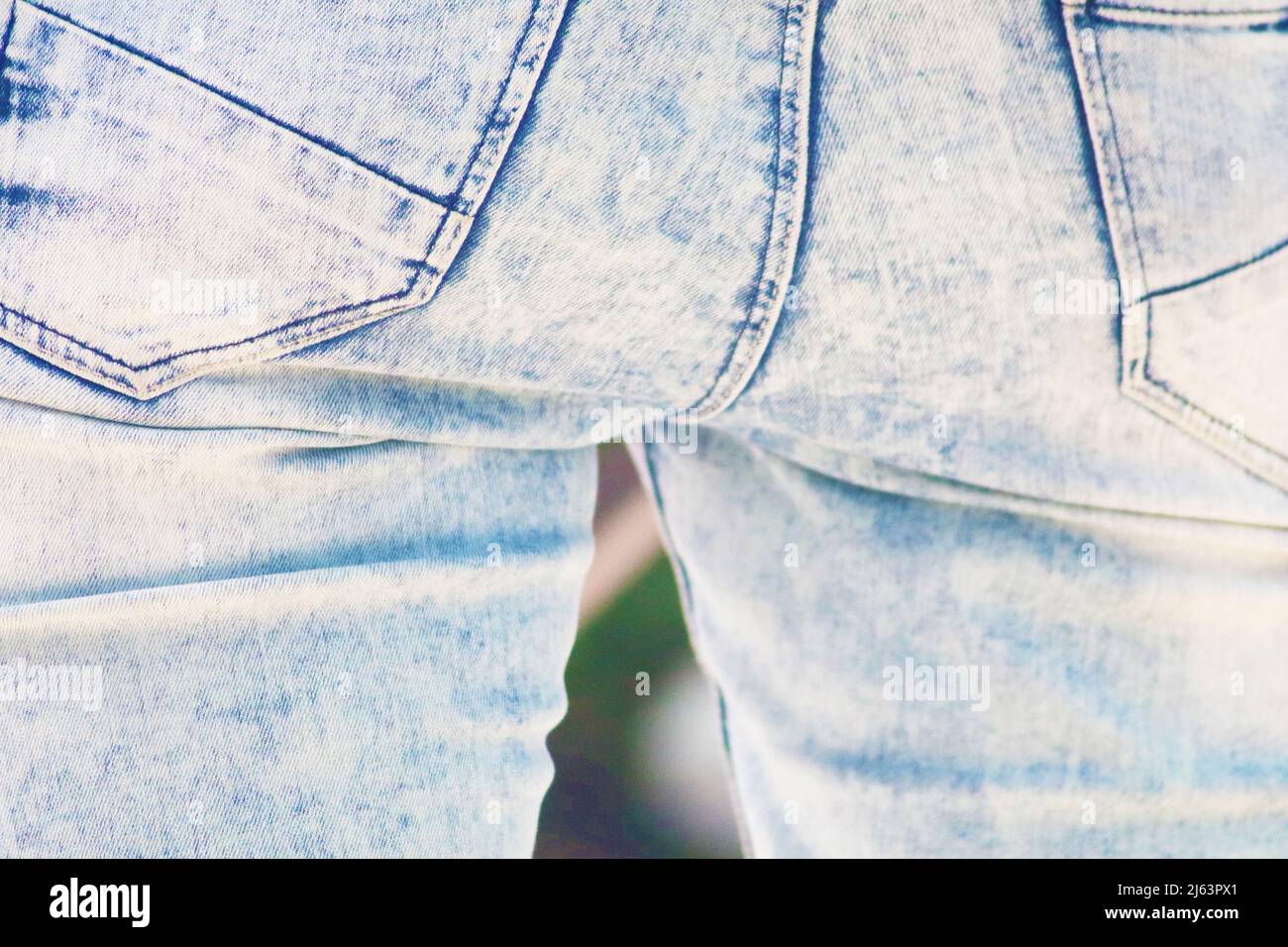 Man wearing of jean pants from back. Male bottom in tight jeans Stock Photo Alamy