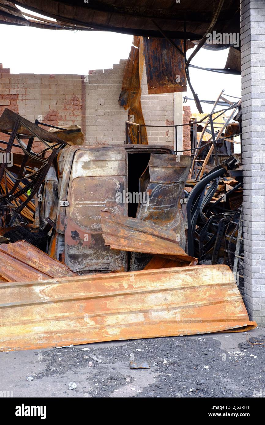 Commercial business premises and equipment destroyed by fire in an arson attack. Tiverton Devon UK Stock Photo