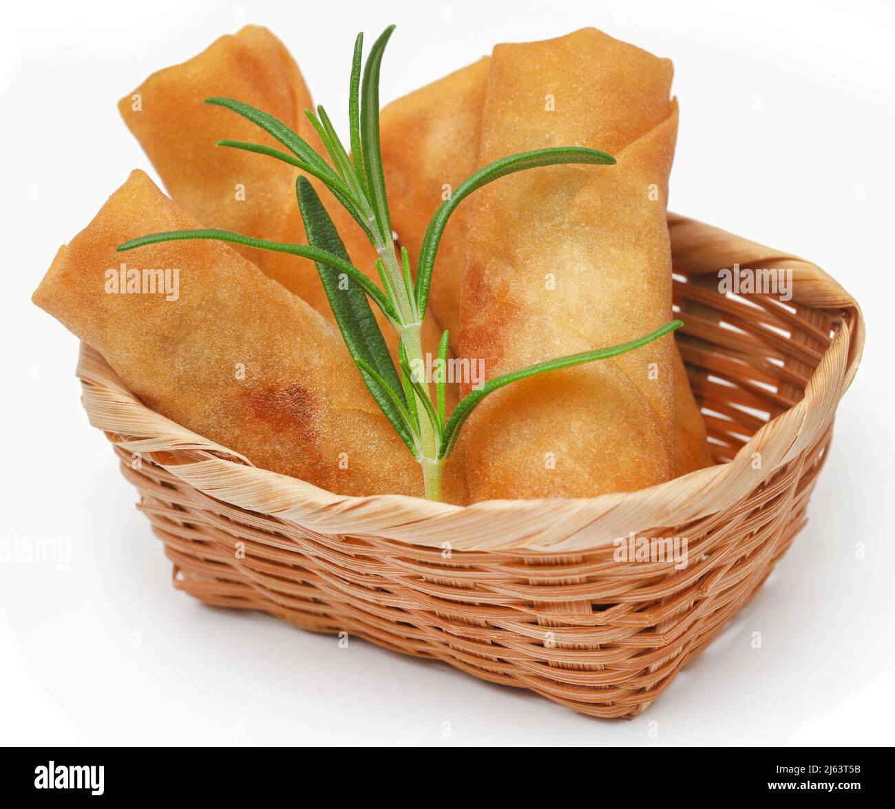 Vegetables rolls with rosemary over white background Stock Photo