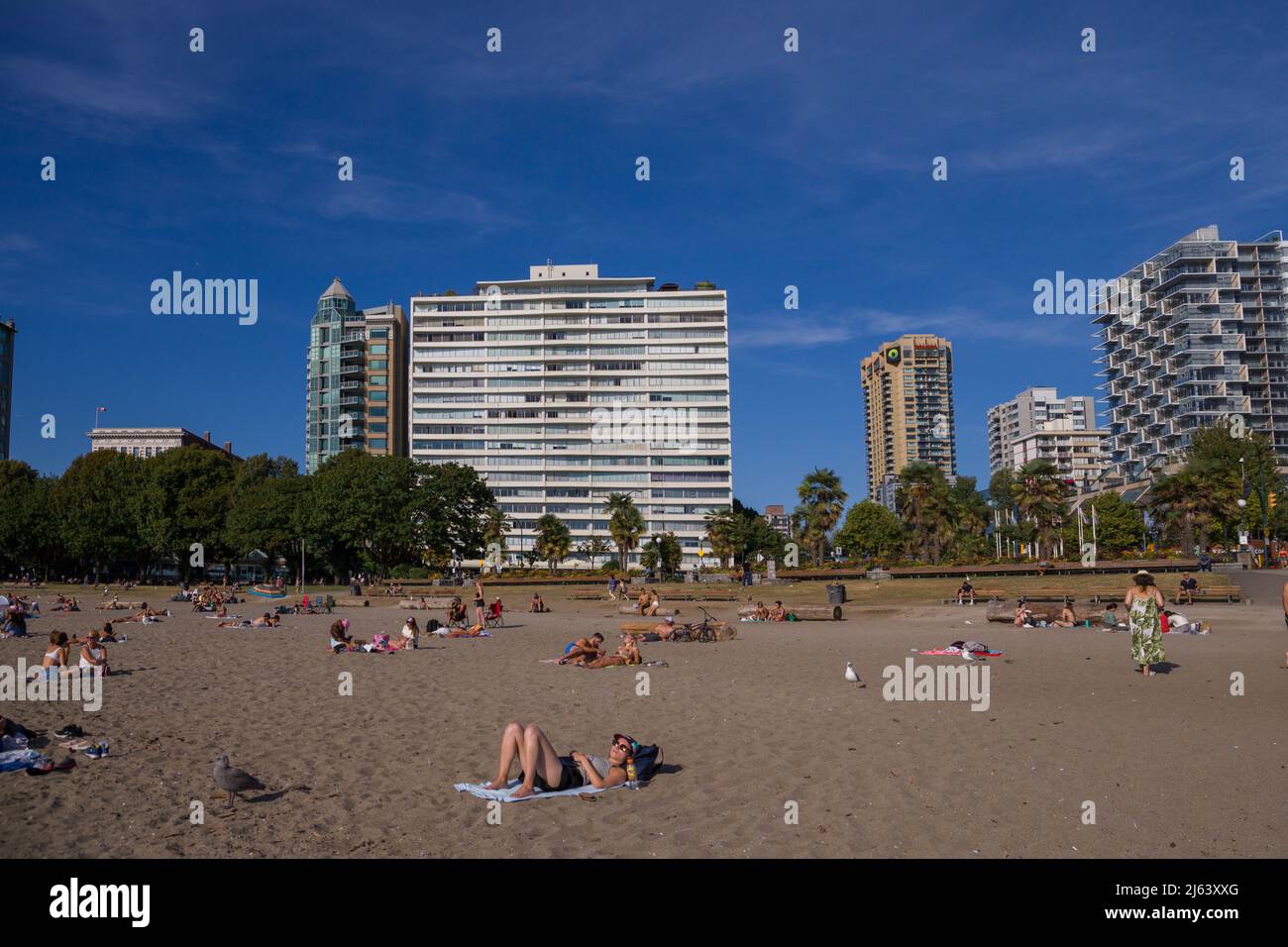 Vancouver downtown. English bay beach. Summer time - people walking, playing and chill out Stock Photo