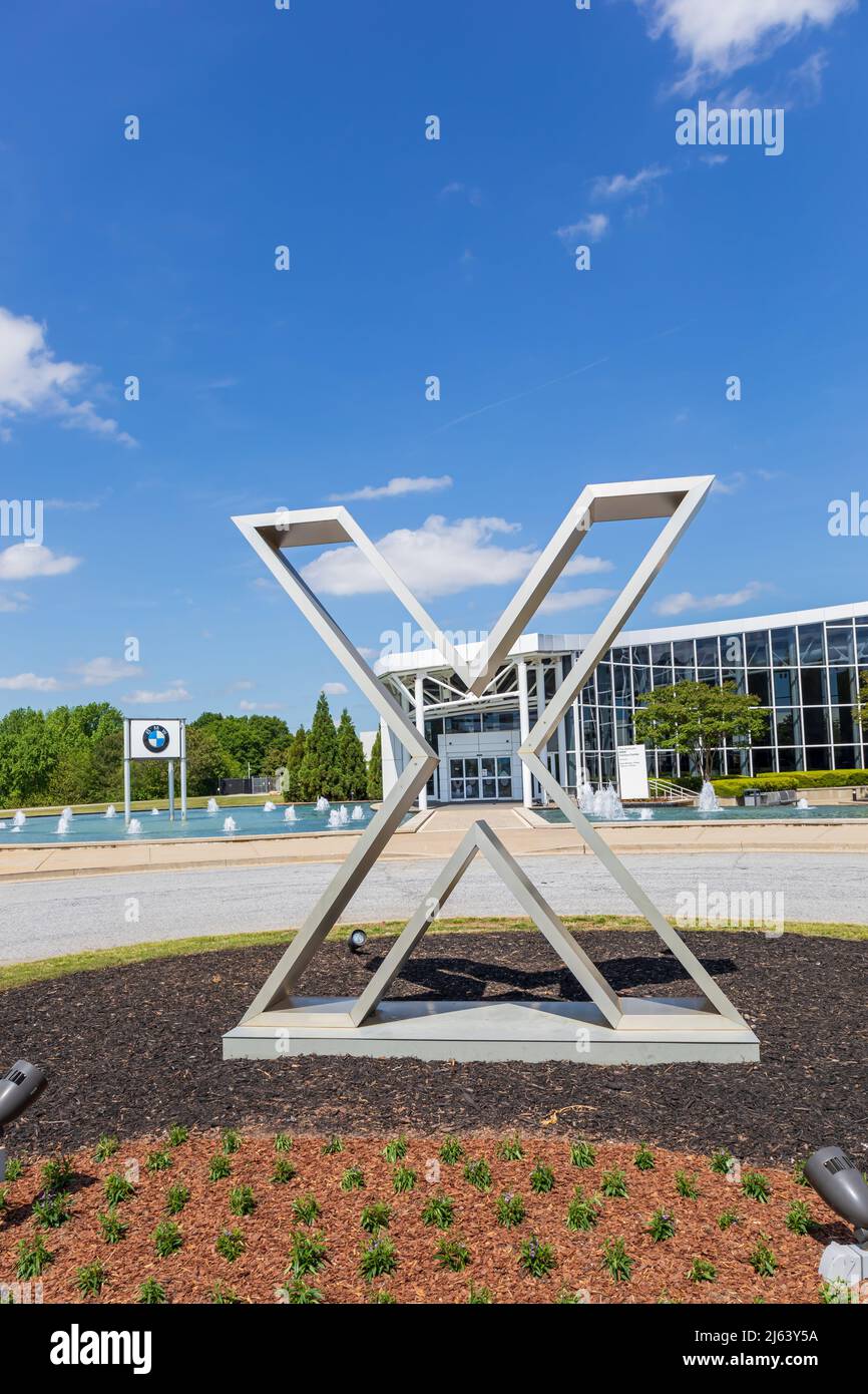 GREER, SC, USA 24 APRIL 2022: View of entranceBMW Zentrum Visitors Center through the large icon 'X'. Stock Photo