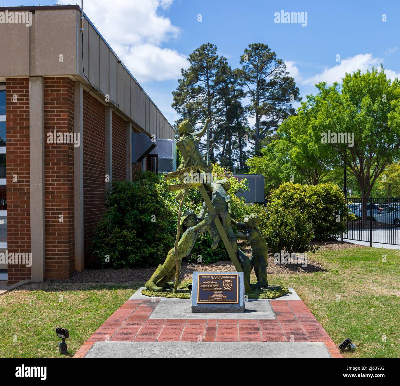 GREER, SC, USA 24 APRIL 2022: Fire Department tribute plaque and sculpture for all firefighters. Square image. Stock Photo