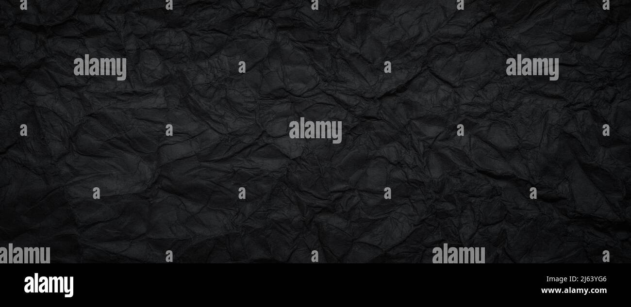 Black crumpled paper texture background Stock Photo