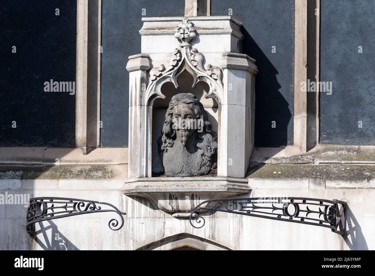 Bust of Charles I on the east side of the tower of St Margaret's Church in Westminster, London, UK Stock Photo