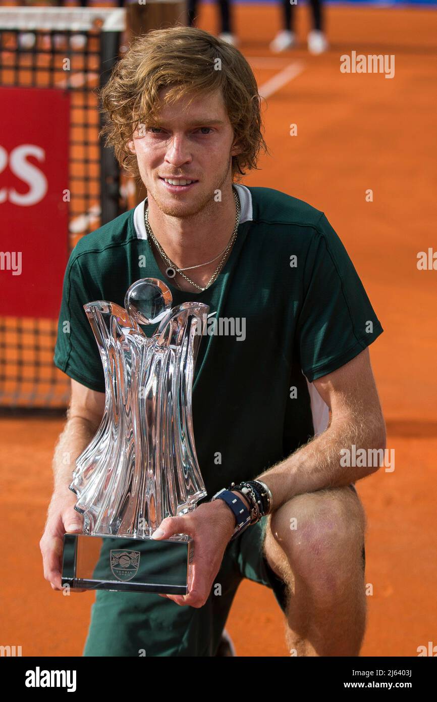 Andrey Rublev of Russia posing with the trophy for the photographers ...