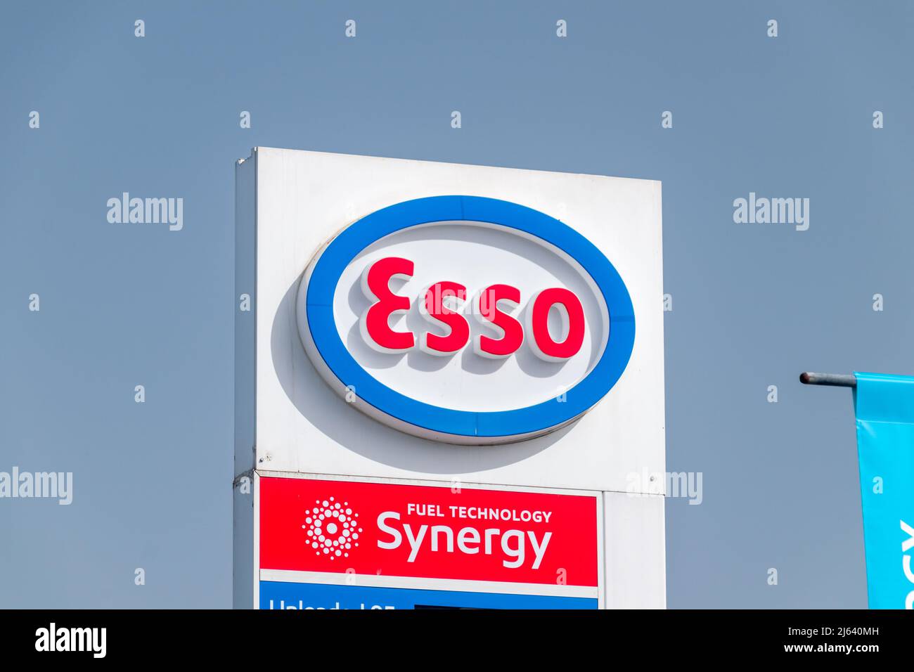 Paphos, Cyprus - April 2, 2022: Logo and sign of Esso on gas station in Paphos. Esso is a trading name for ExxonMobil. Stock Photo