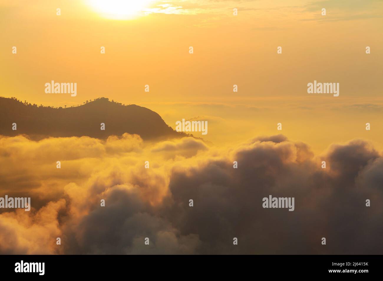 Beautiful view above clouds in mountains Stock Photo Alamy