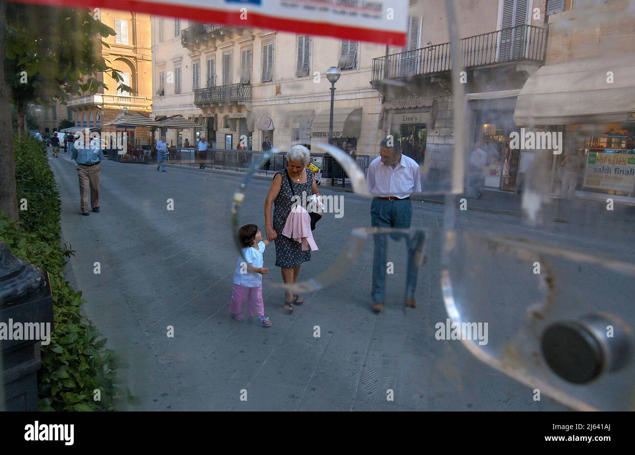 Siena, Italy 04/07/2005: Elderly couple with grandson. ©Andrea Sabbadini Stock Photo