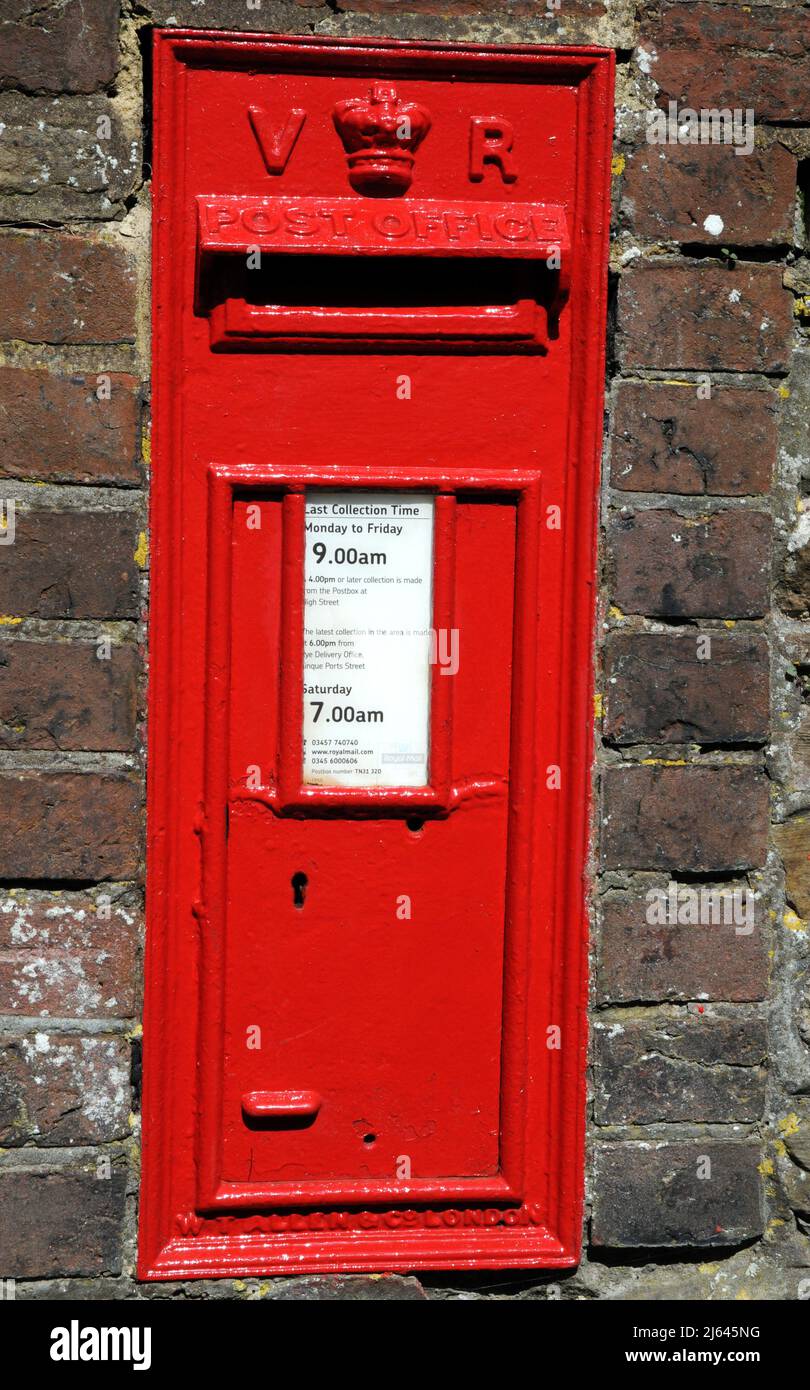 A wall mounted mail box dating from the reign of Queen Victoria in the historic town of Rye, East Sussex, UK. Stock Photo
