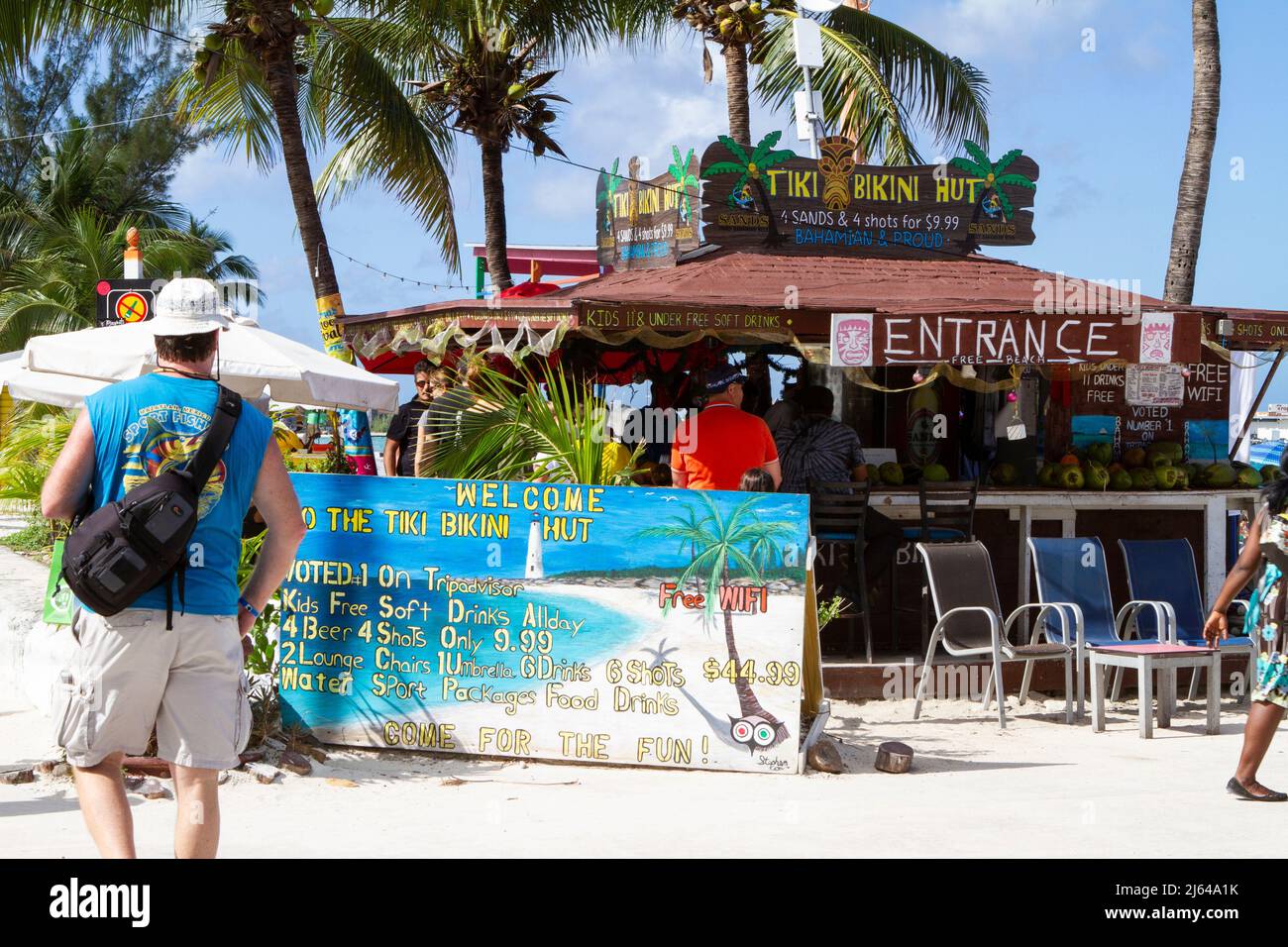 Tourists at the colorful beachside Tiki Bikini Hut in Nassau, New ...